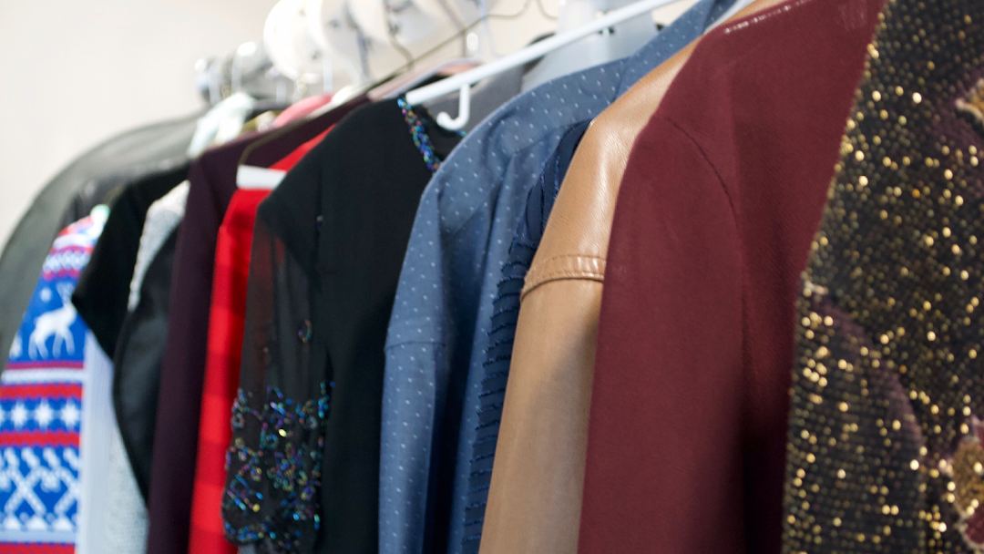 Several Items of Clothing Hung up with Hangers on a Garment Hanger